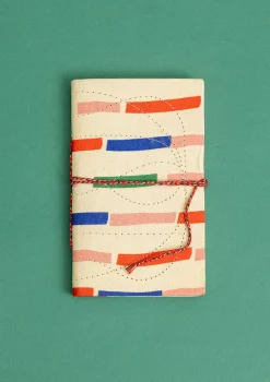 Divya-muistikirja kangaspäällysteistä paperia